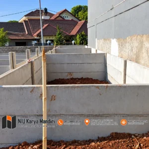 Lorong Partisi Beton di Lokasi Konstruksi